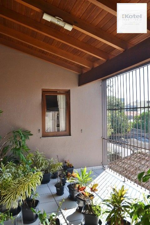 Casa Comercial e Residencial com 518m² (4 quartos / 5 banheiros / 3 vagas garagem) no Bairro Partenon localizada à meia quadra da Av. Bento Gonçalves. — foto 3