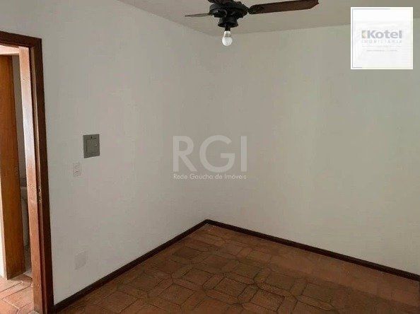 Casa no bairro Jardim Botânico de 3 dormitórios — foto 5