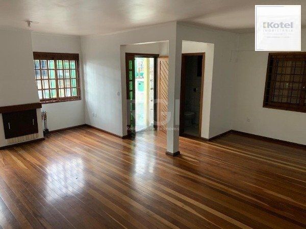 Casa no bairro Jardim Botânico de 3 dormitórios — foto 2