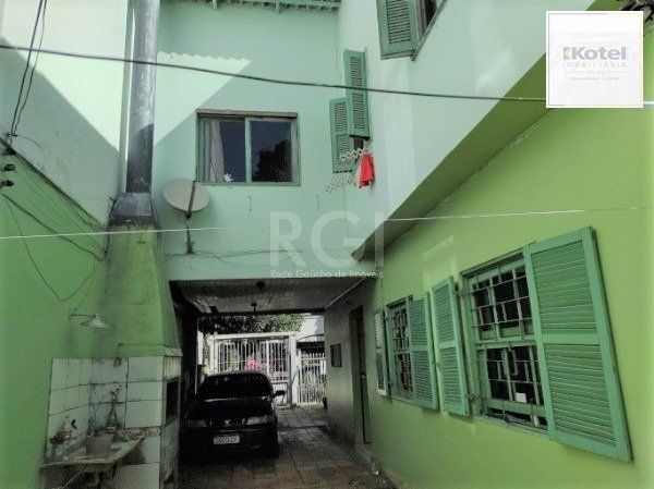 Casa sobrado no bairro Petrópolis de 4 dormitórios — foto 3