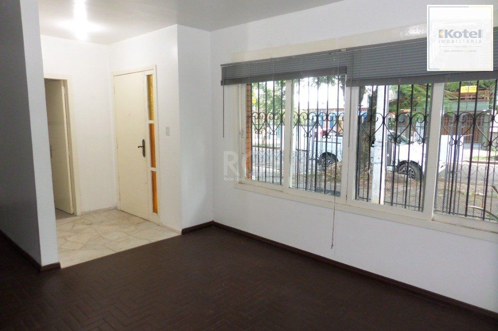 Casa no bairro Jardim Botânico de 3 dormitórios e 2 vagas