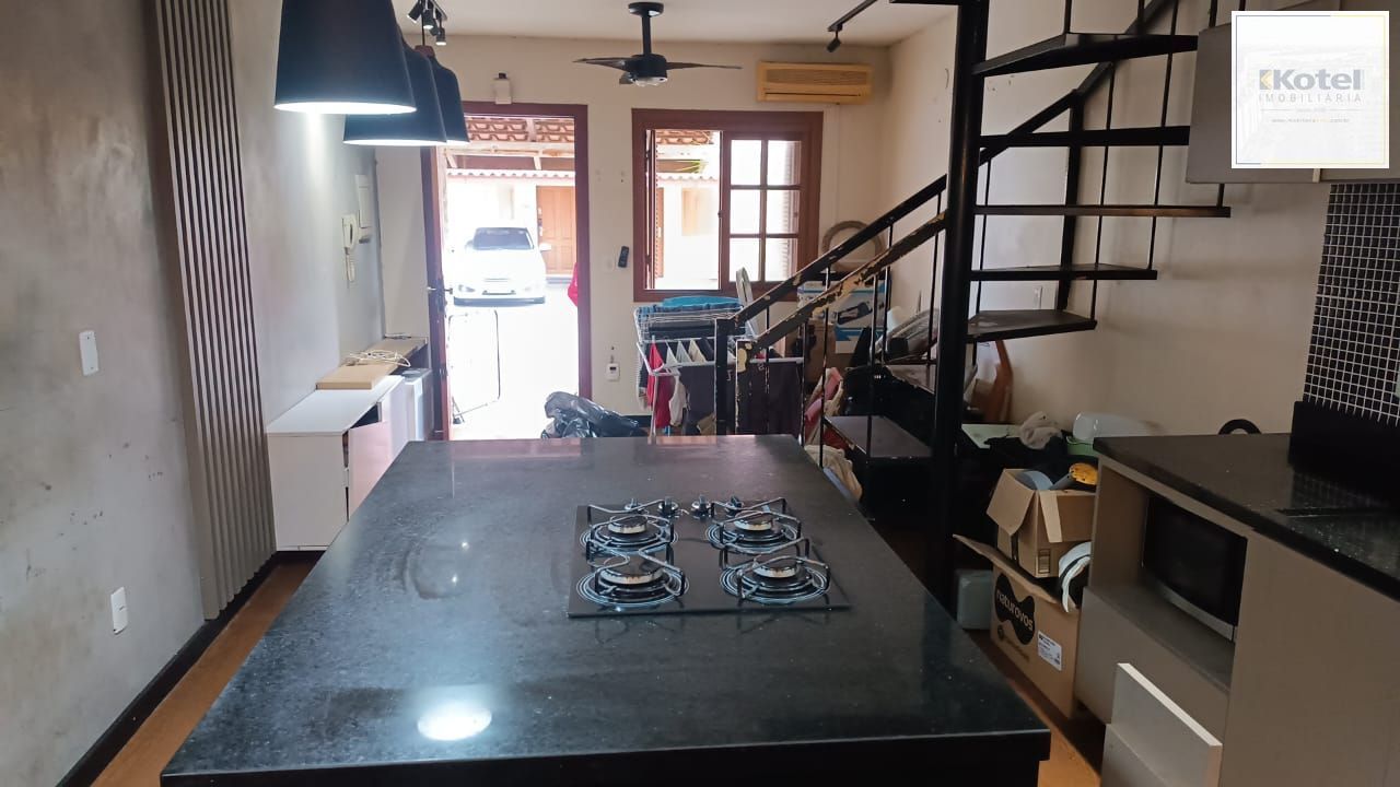 Casa sobrado em condomínio no bairro Camaquã de 3 dormitórios e vaga DESOCUPADO — foto 2