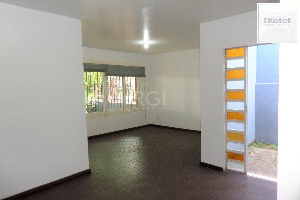 Casa no bairro Jardim Botânico de 3 dormitórios e 2 vagas