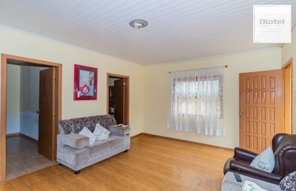 Casa / Terreno com 3 casas de alvenaria no bairro Morro Santana