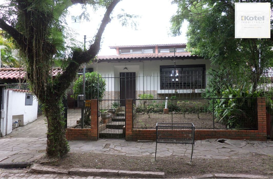 Casa no bairro Ipanema de 3 dormitórios e 2 vagas DESOCUPADA — foto 2
