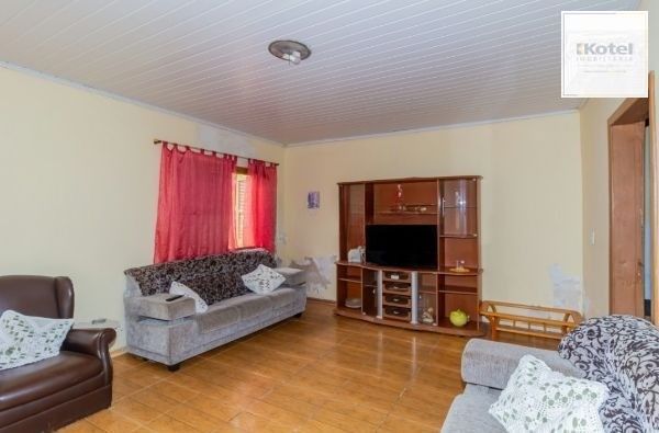 Casa / Terreno com 3 casas de alvenaria no bairro Morro Santana