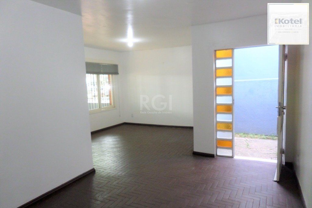 Casa no bairro Jardim Botânico de 3 dormitórios e 2 vagas