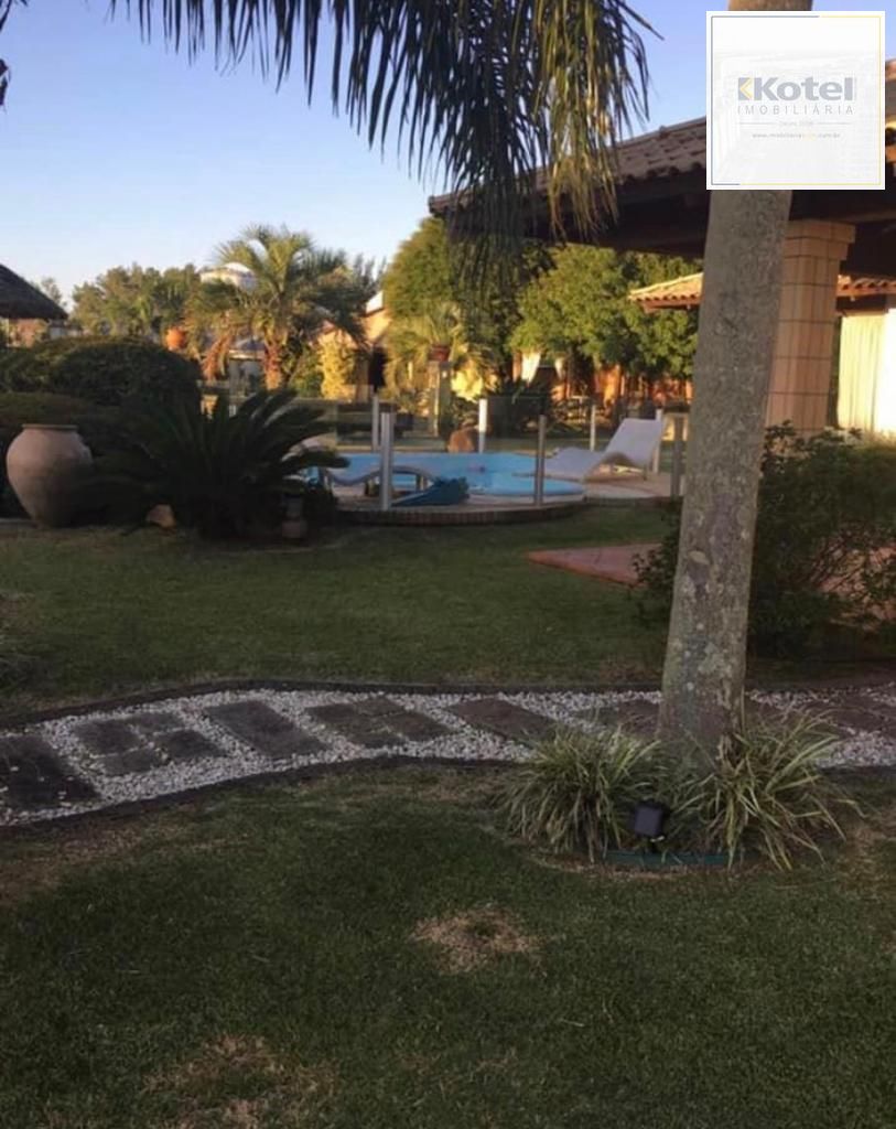 Casa na praia de Atlântida de 4 dormitórios