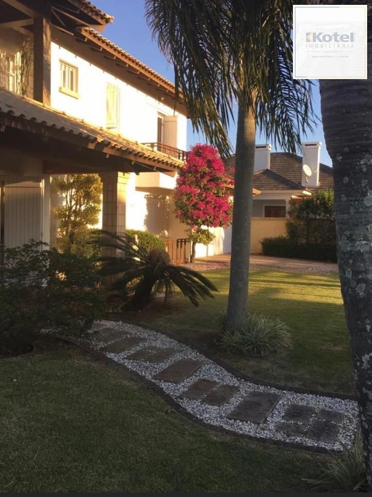 Casa na praia de Atlântida de 4 dormitórios