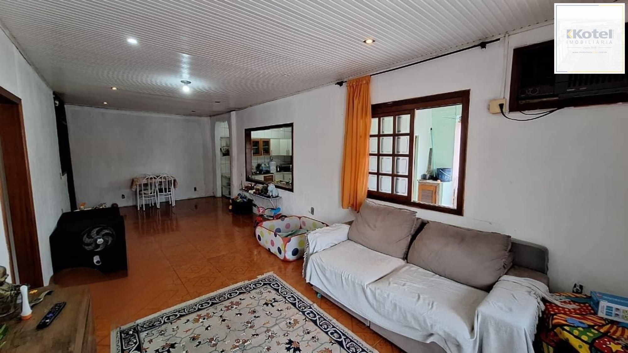 Casa de 4 dormitórios e 4 vagas de garagem em Canoas.