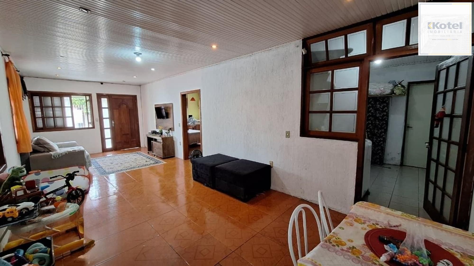Casa de 4 dormitórios e 4 vagas de garagem em Canoas.
