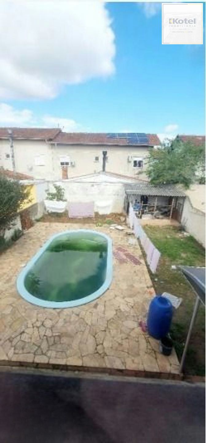 Casa com 5 quartos, piscina e 3 vagas de garagem em Canoas.