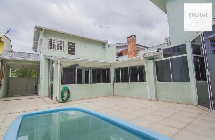 Casa 4 quartos, 4 suítes, 4 vagas e pátio com piscina no Bairro Vila Ipiranga