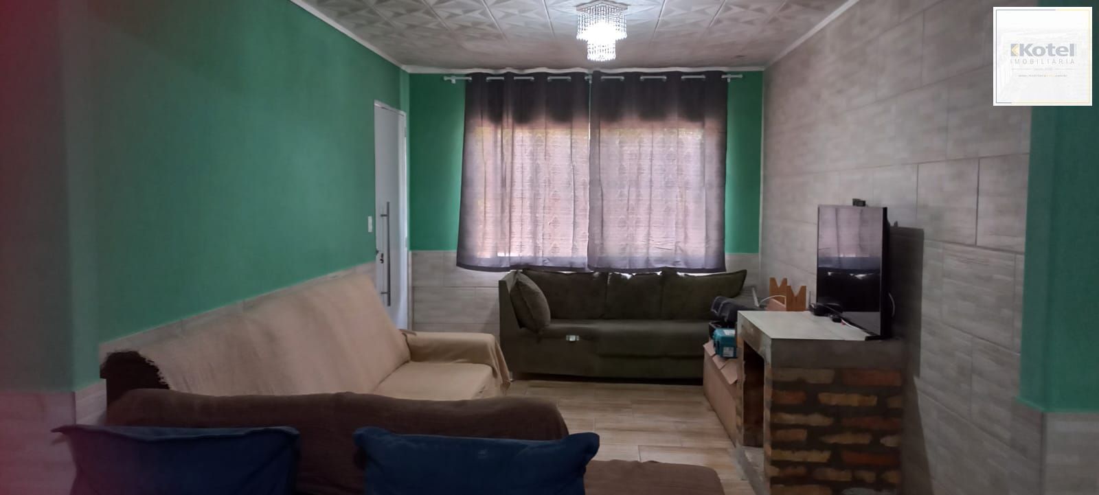 Casa com 4 dormitórios e 2 vagas de garagem em Viamão.