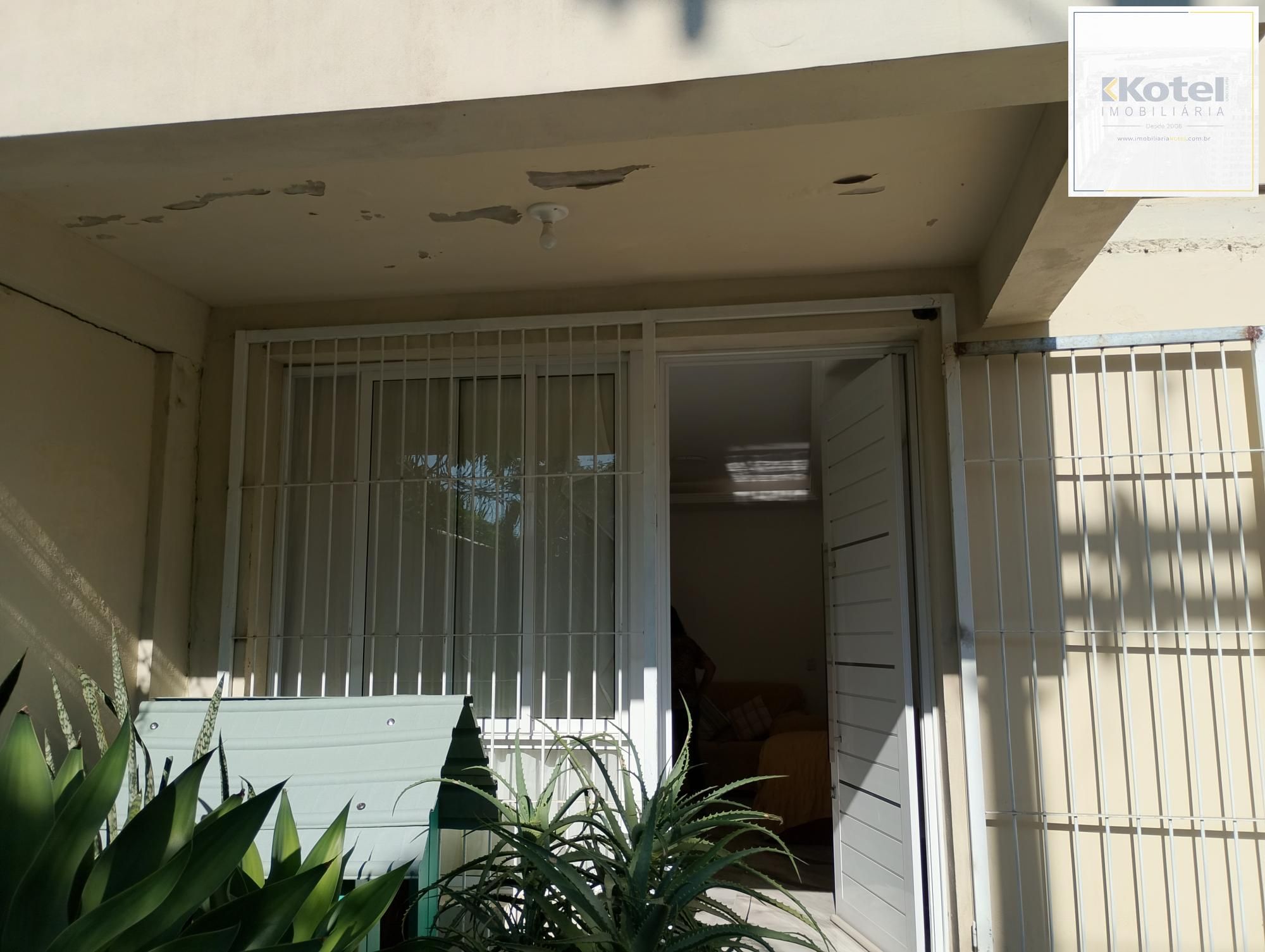 Casa com 3 quartos, 4 vagas de garagem e com pátio no bairro Parque Santa Fé — foto 3
