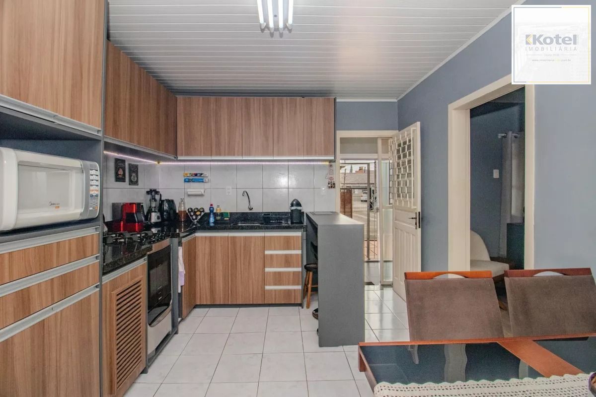 Casa com 1 quarto, churrasqueira e 4 vagas no bairro Sarandi — foto 5