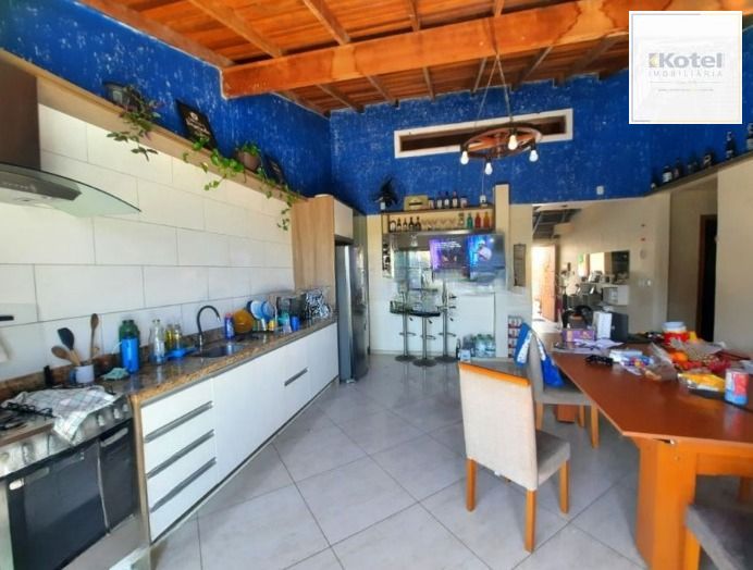 Casa de 4 quartos,suíte,churrasqueira no bairro Nonoai — foto 5