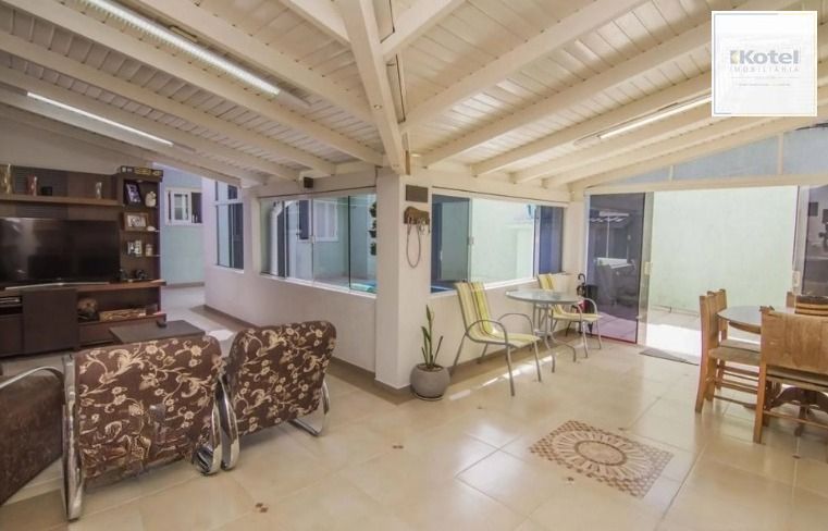 Casa 4 quartos, 4 suítes, 4 vagas e pátio com piscina no Bairro Vila Ipiranga — foto 2