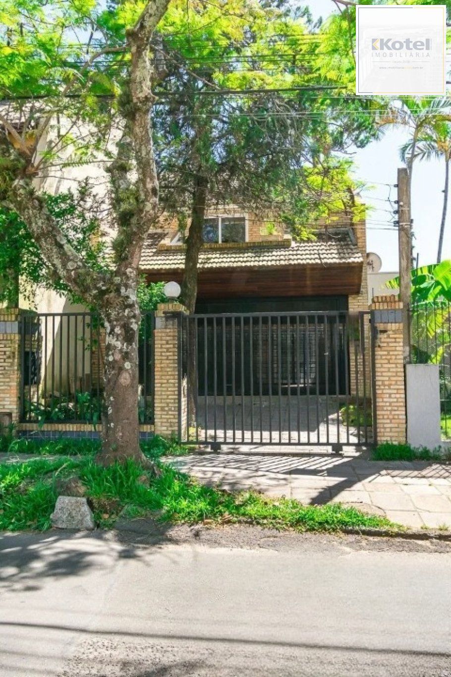 Casa com 3 quartos, 1 suíte, 2 vagas, e 234m² à venda no bairro Tristeza — foto 2