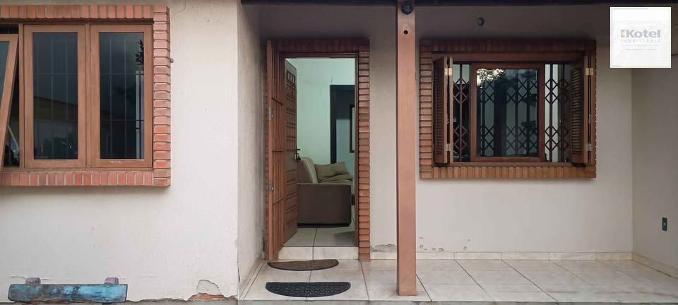 Casa 2 dormitórios com garagem e churrasqueira no Sarandi — foto 2