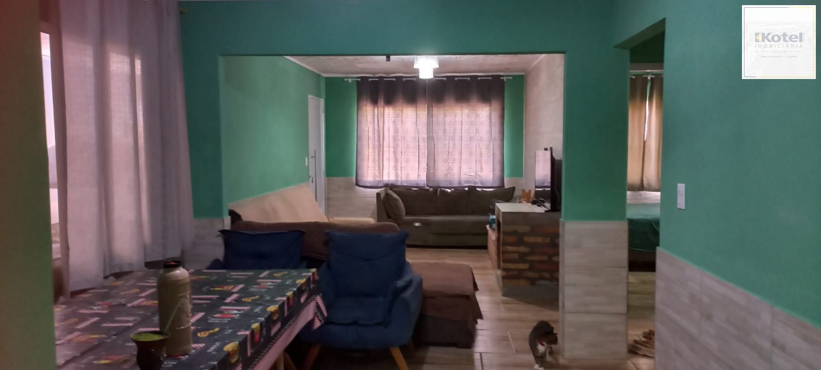 Casa com 4 dormitórios e 2 vagas de garagem em Viamão.