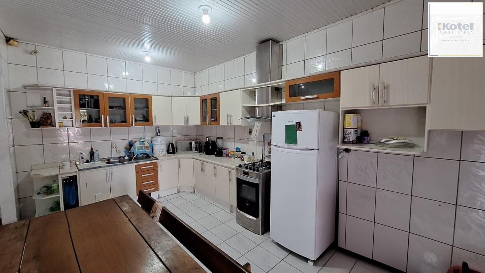 Casa de 4 dormitórios e 4 vagas de garagem em Canoas.