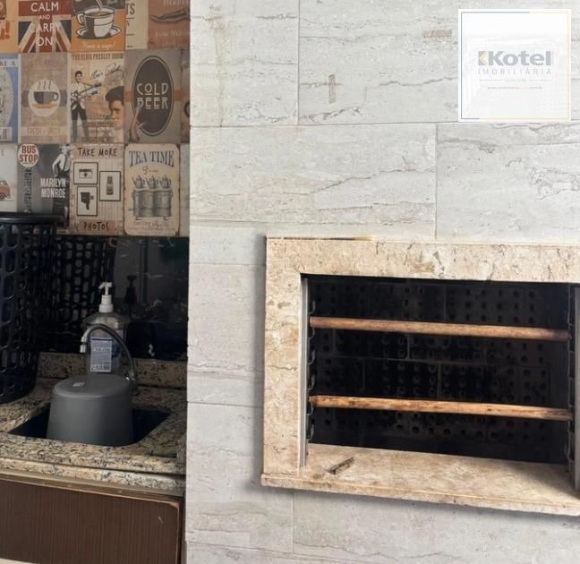 Casa de dois dormitórios com  02 suítes e 01 vaga de garagem