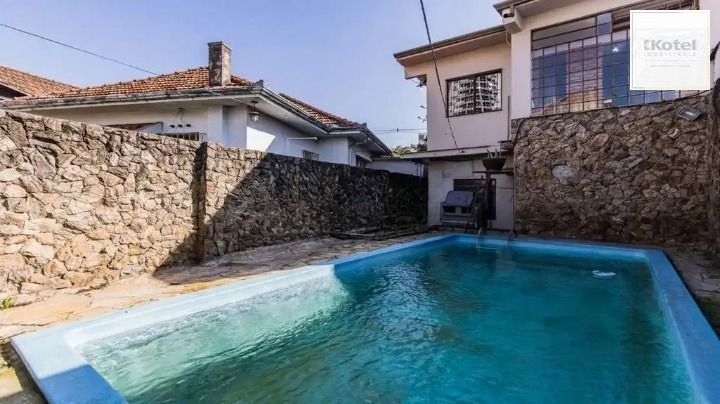 Casa/sobrado 3 dormitórios no bairro Auxiliadora em Porto Alegre — foto 2