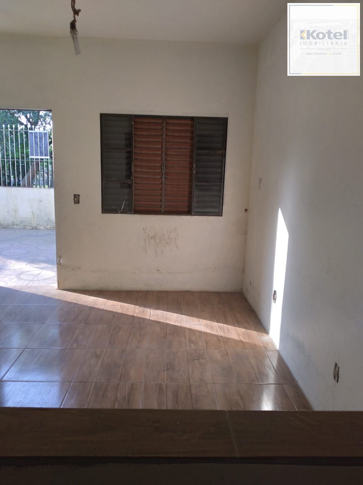 Casa com 2 dorm.  de  alvenaria em região arborizanada.