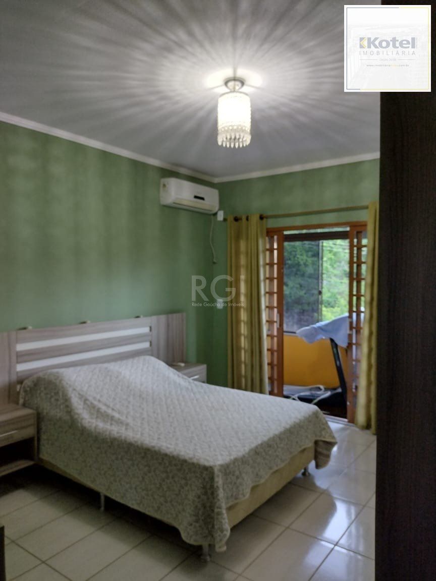 Casa para Venda - 0.18m², 2 dormitórios, sendo 2 suites, 3 vagas - Lomba do Pinheiro — foto 5