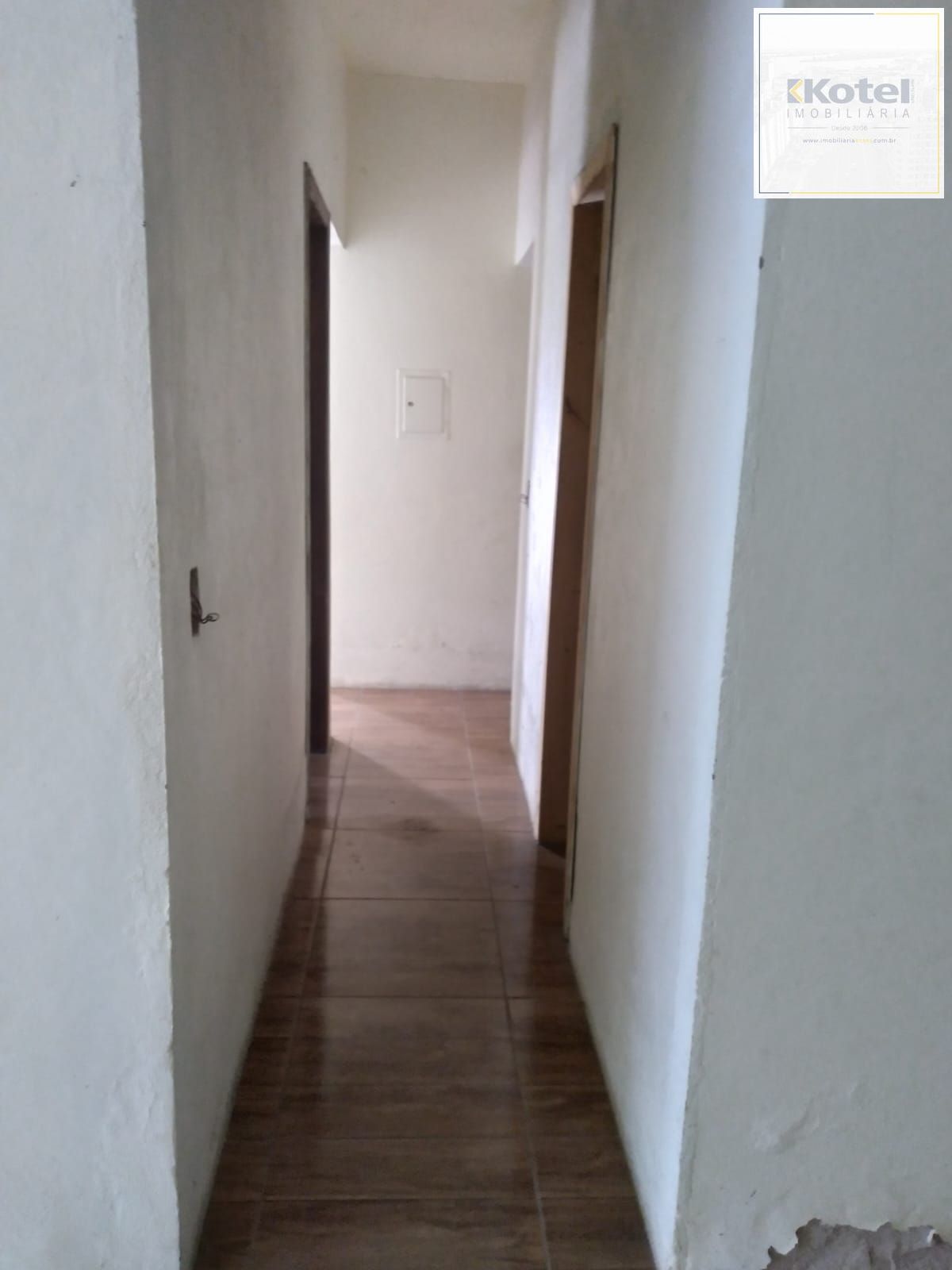 Casa com 2 dorm.  de  alvenaria em região arborizanada.