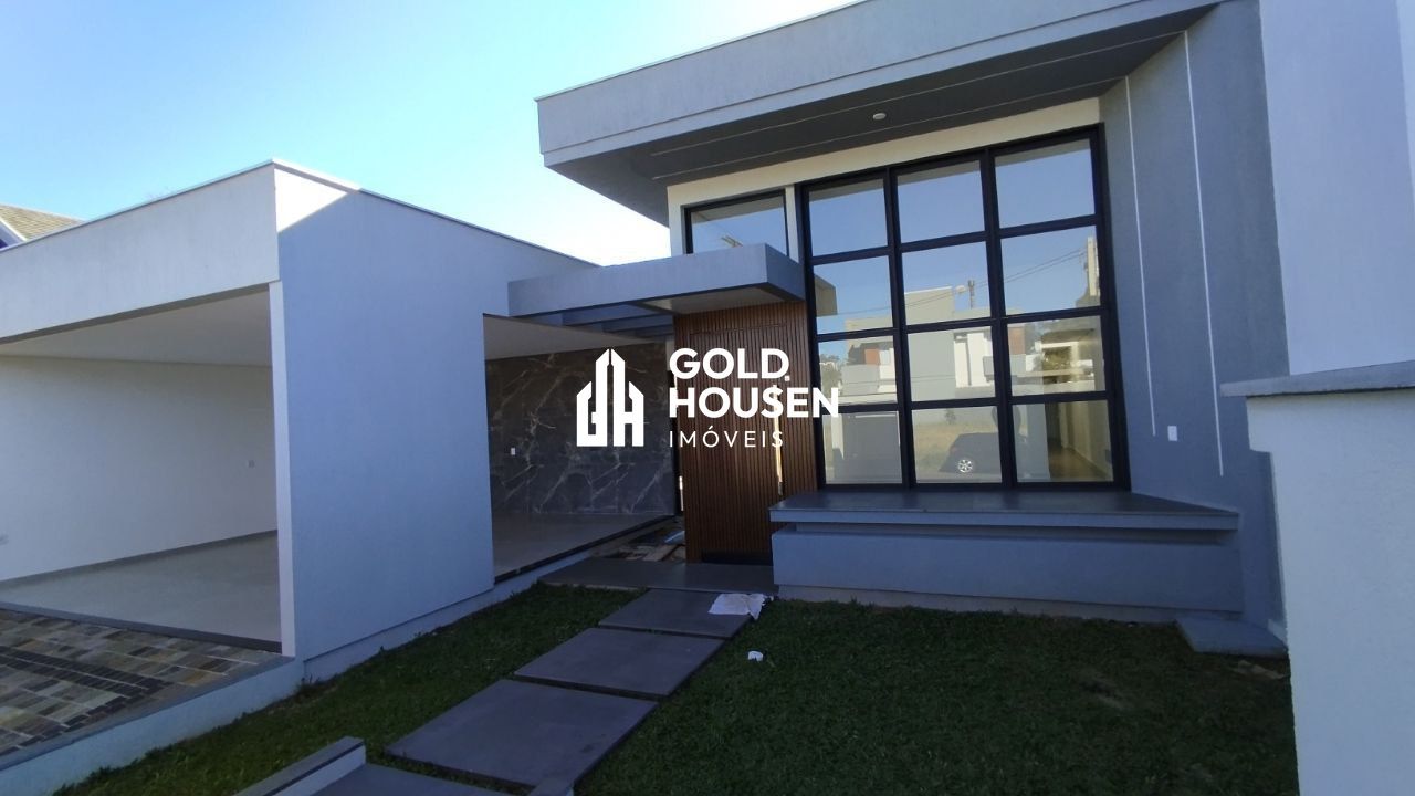 Casa plana de alto padrão com 3 suítes, lareira e pátio murado no Universitário - Lajeado/RS