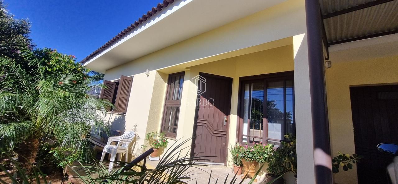 Casa à venda com 3 quartos, 117m² - Foto 1