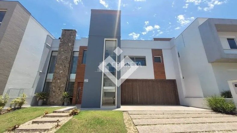 Casa Semimobiliada de Alto Padrão com 3 Quartos em Condomínio Fechado- Tomazetti