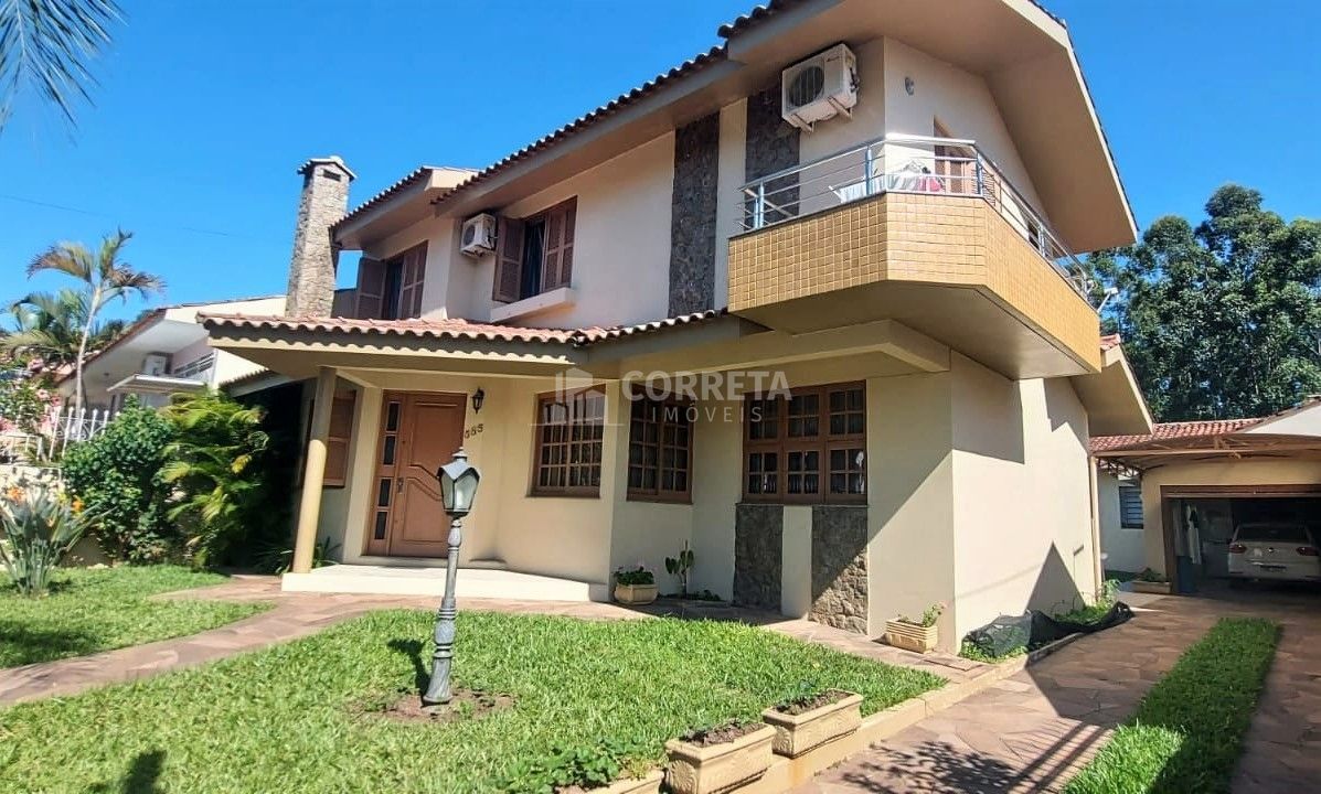Linda casa de 3 dormitórios, com sacada, cozinha, lareira, 2 salas, churrasqueir