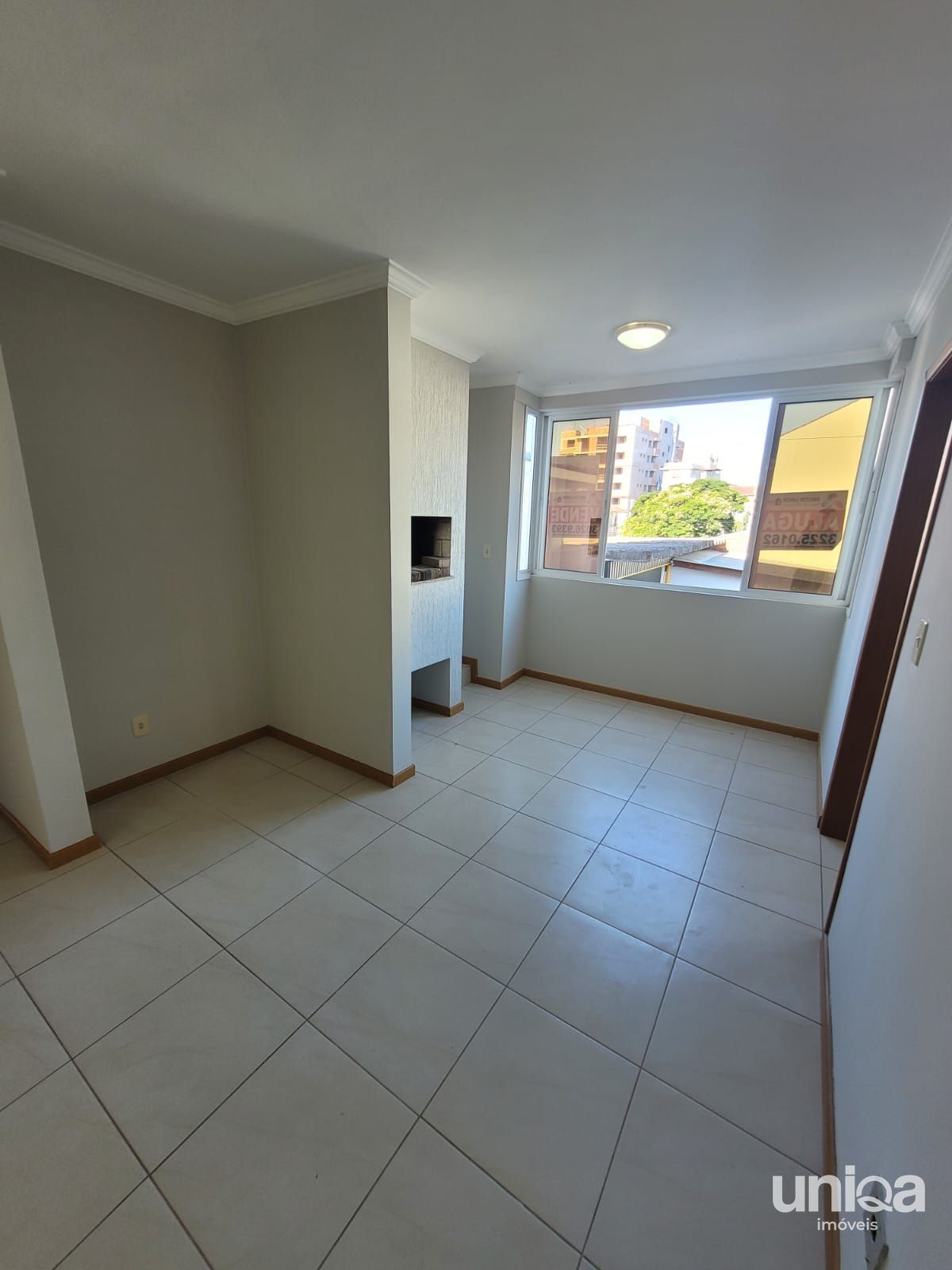 Apartamento com 3 dormitórios, sacada, churrasqueira e garagem próximo a UFSM