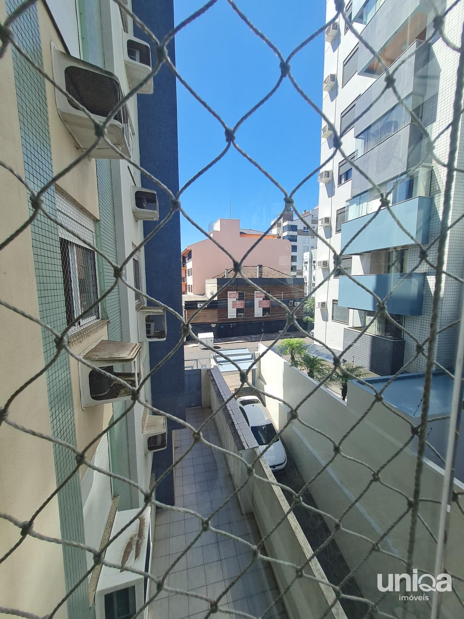 Apto 02 dormitórios Suíte Sacada Churrasqueira Elevador Garagem - Ed Orion