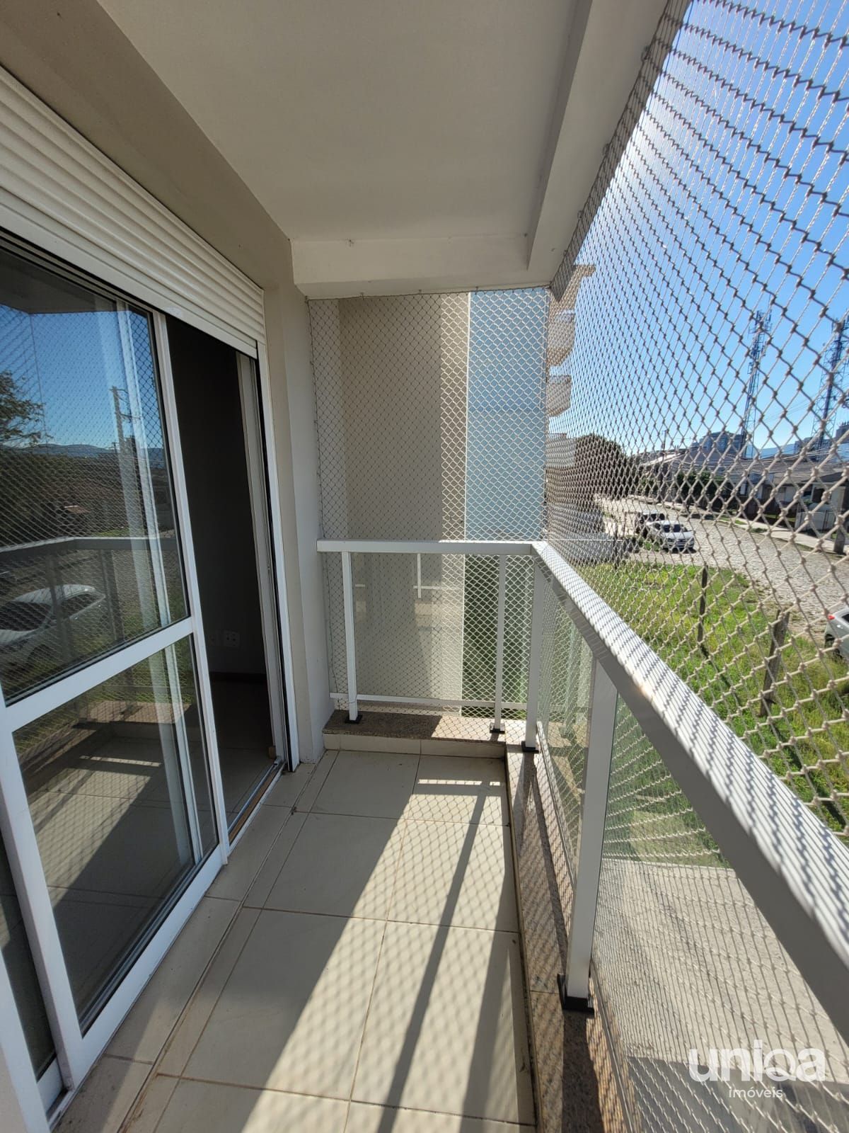 Apartamento com 3 dormitórios, sacada, churrasqueira e garagem próximo a UFSM