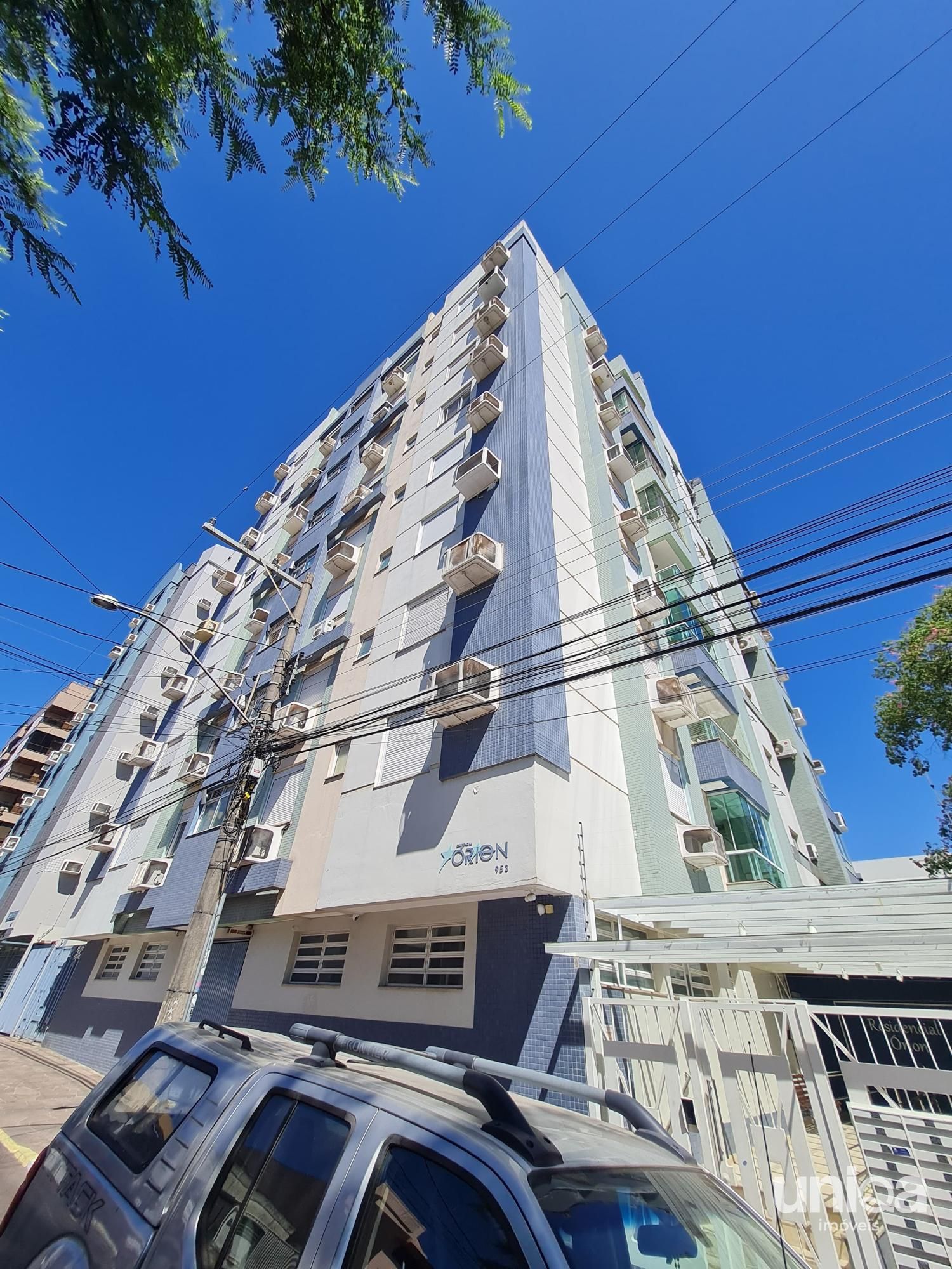 Apto 02 dormitórios Suíte Sacada Churrasqueira Elevador Garagem - Ed Orion