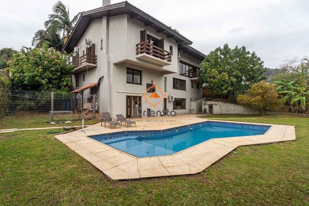Casa com 417m², 3 dormitórios no bairro Teresópolis em Porto Alegre para Comprar