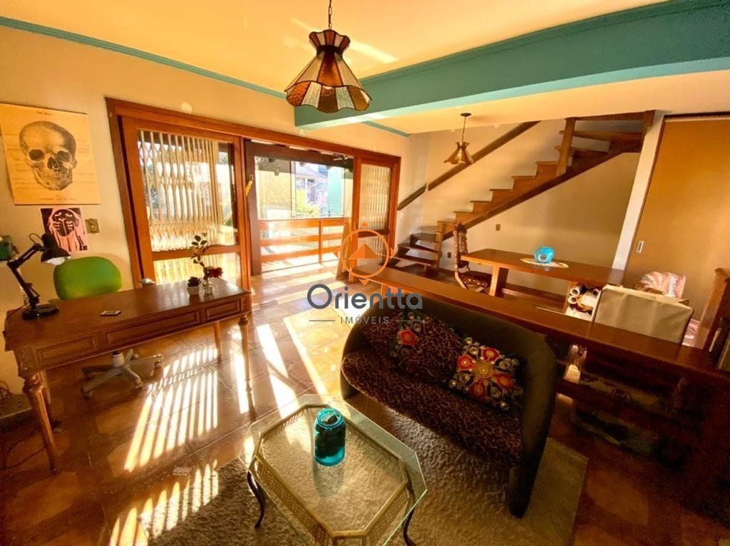 Casa com 263m², 3 dormitórios no bairro Higienópolis em Porto Alegre para Comprar