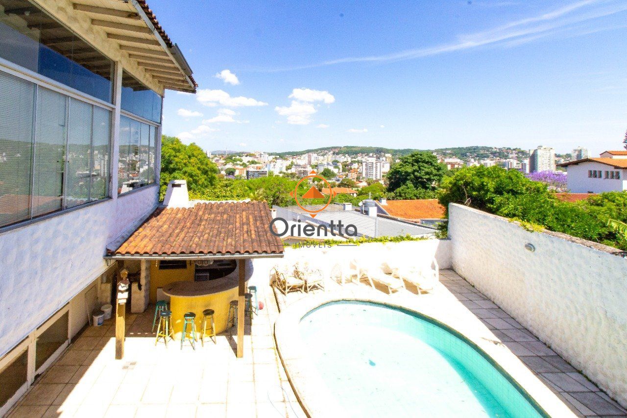 Casa com 422m², 6 dormitórios no bairro Vila Assunção em Porto Alegre para Comprar