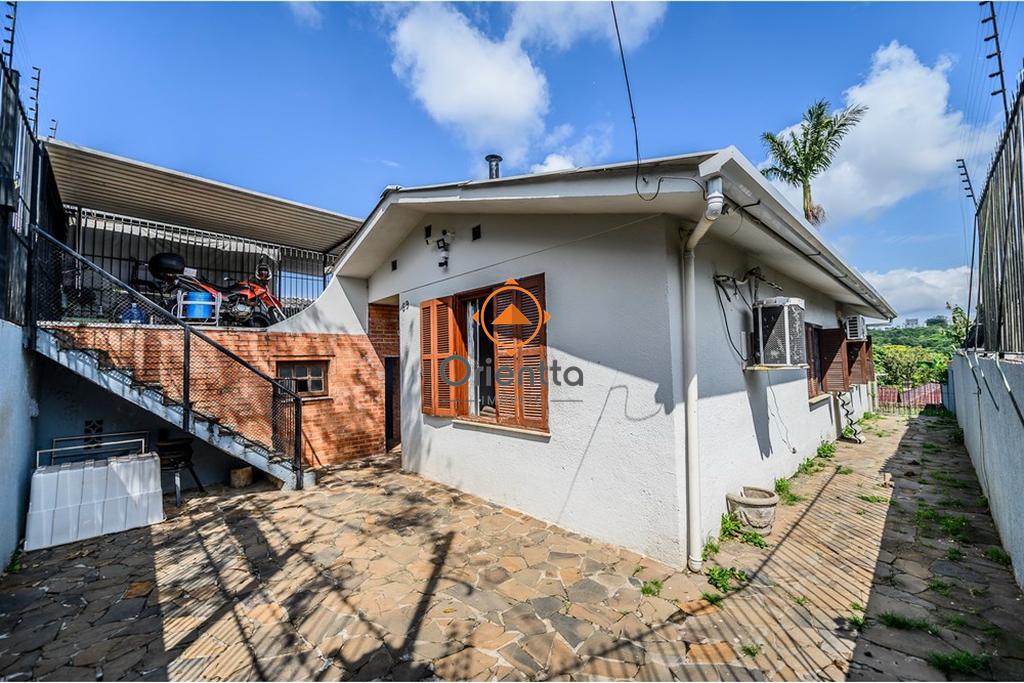 Casa com 129m², 3 dormitórios no bairro Santa Tereza em Porto Alegre para Comprar