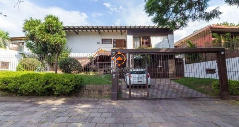 Casa, 4 dormitórios no bairro Chácara das Pedras em Porto Alegre para Comprar ou Alugar