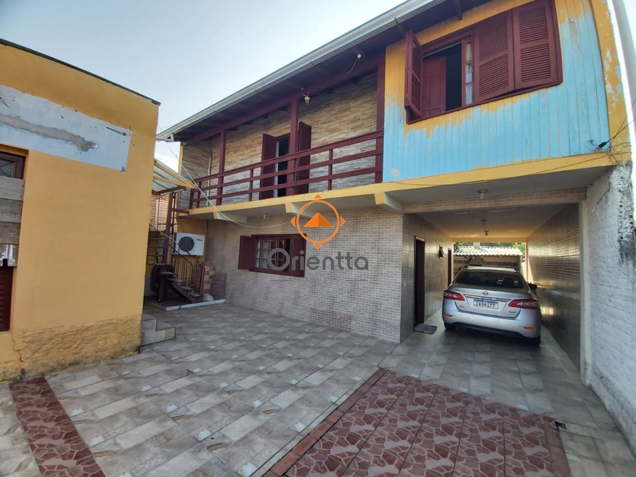 Casa, 3 dormitórios no bairro Vila Nova em Porto Alegre para Comprar