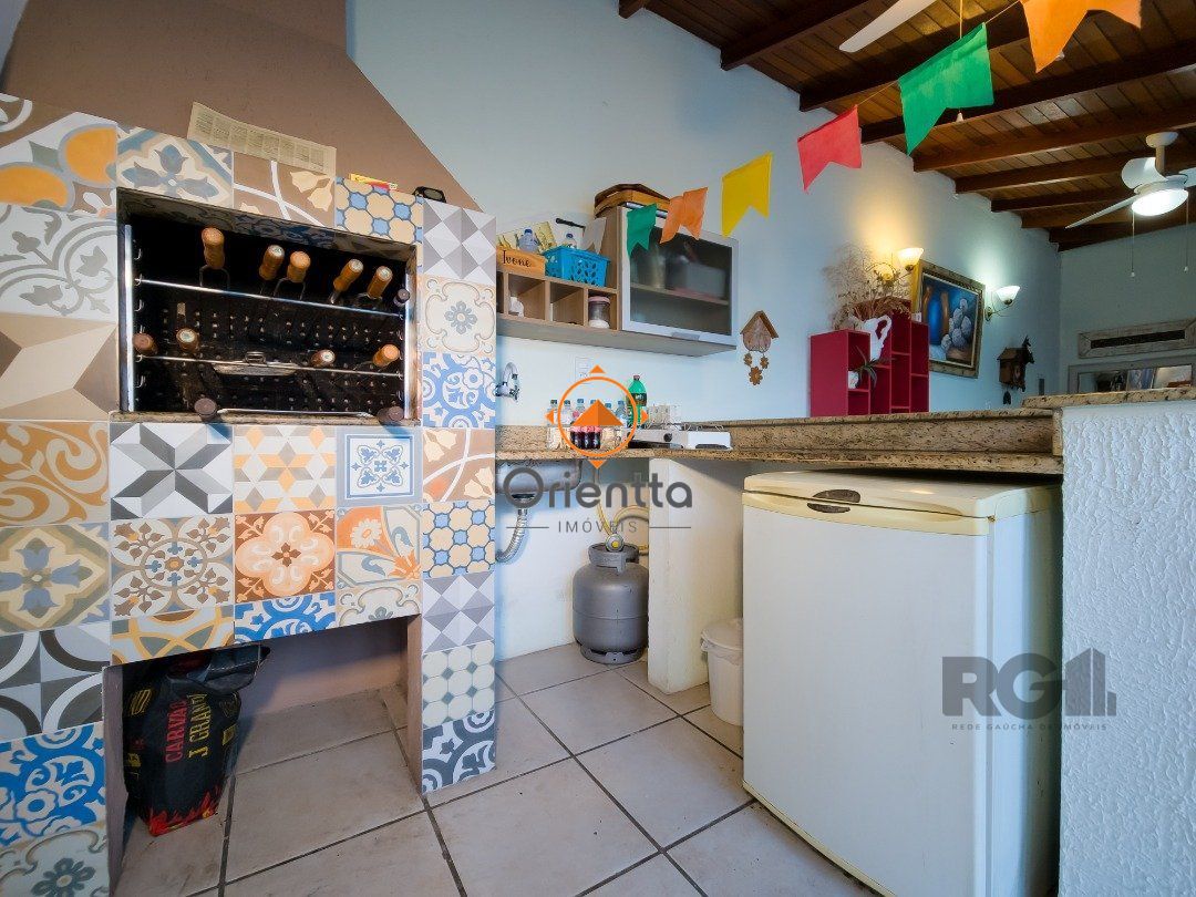 Casa de Condomínio com 233m², 3 dormitórios no bairro Cavalhada em Porto Alegre para Comprar