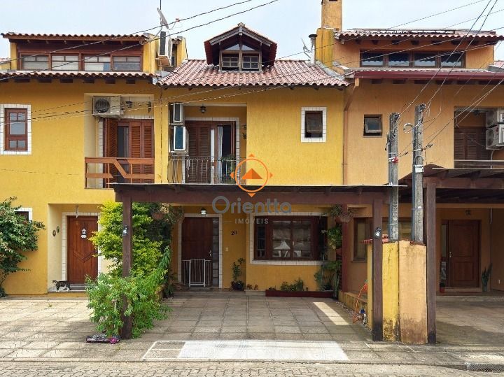Casa de Condomínio, 3 dormitórios no bairro Hípica em Porto Alegre para Comprar