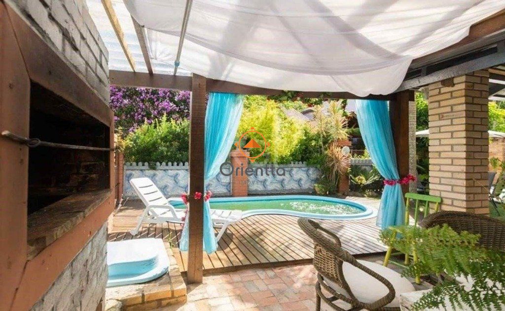 Casa de Condomínio com 180m², 3 dormitórios no bairro Vila Nova em Porto Alegre para Comprar