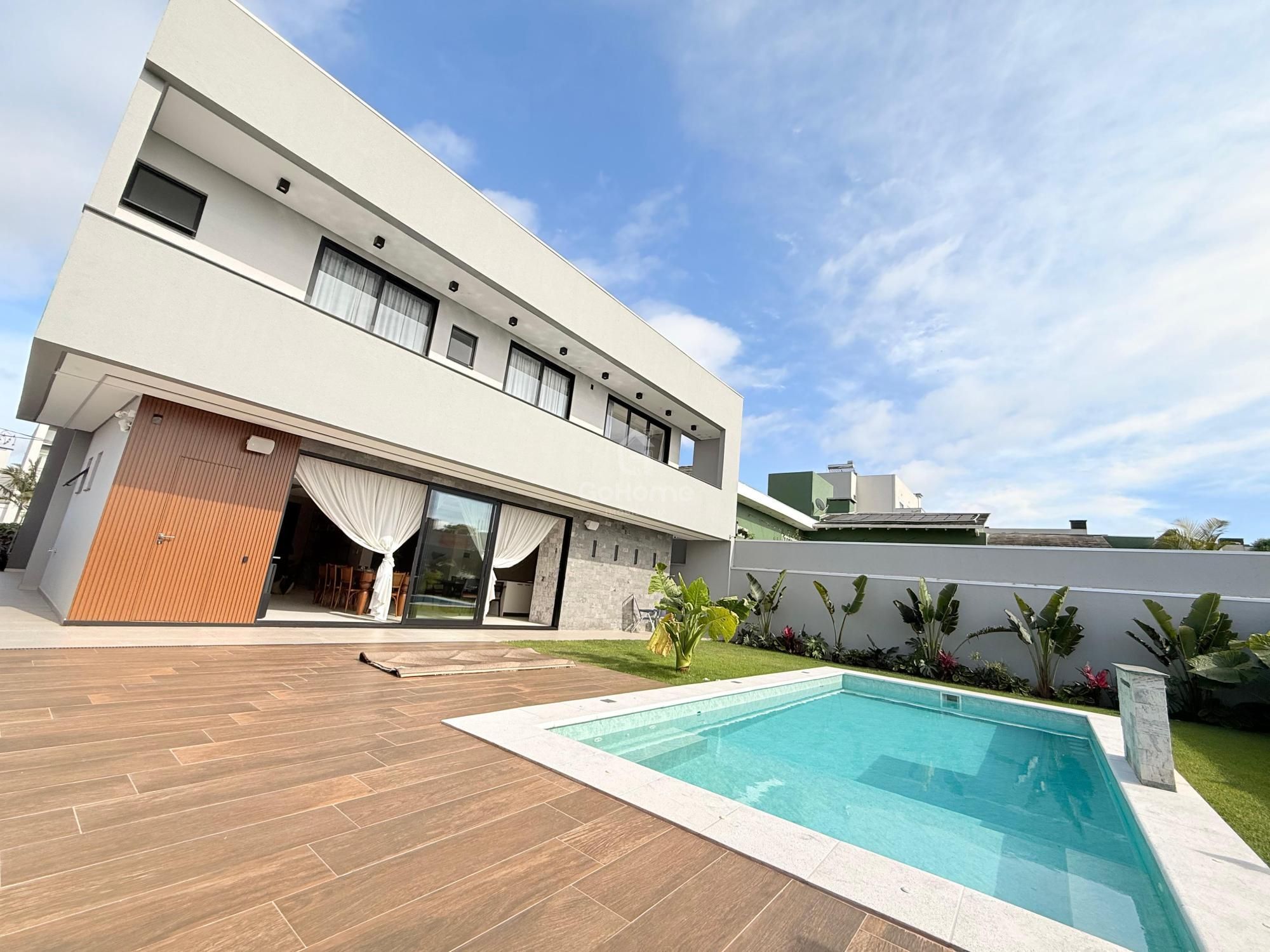 Casa com Quatro Suítes
