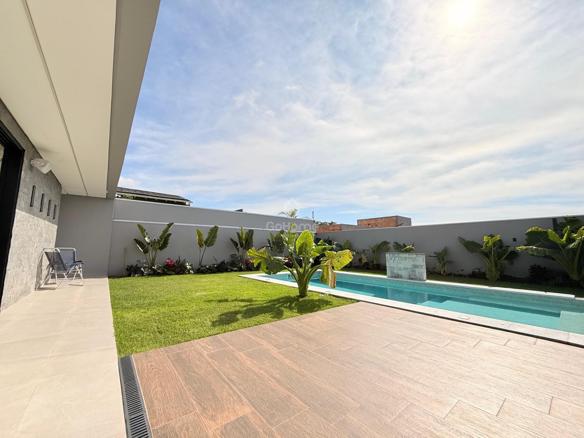 Casa com Quatro Suítes